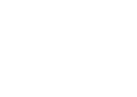 White city skyline silhouette over arched bridge